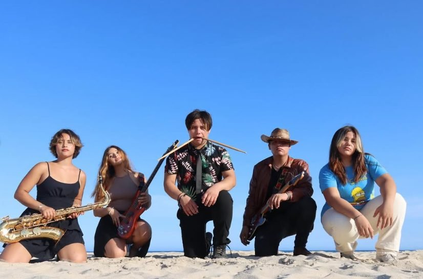 Kids Monsters, the five-sibling family band, on the beach in Cabo San Lucas